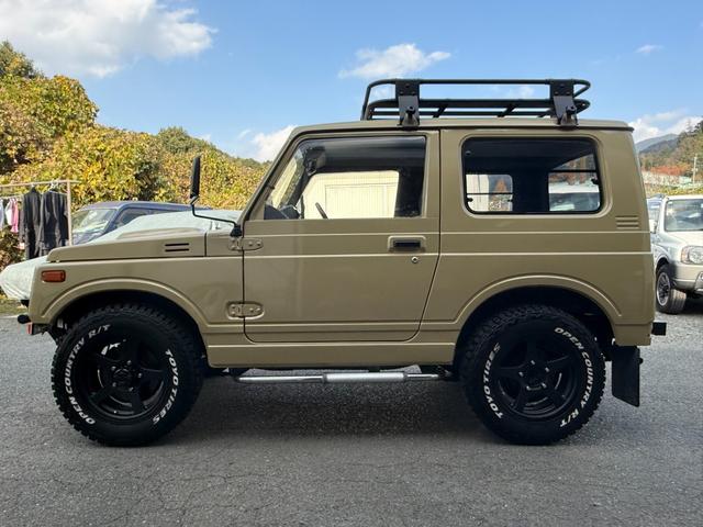 ジムニー ワイルドウインドリミテッド　オールペイント　社外バンパー　ディスプレイオーディオ　サイドステップ　ルーフキャリア　１６インチアルミホイール　タンクガード（6枚目）