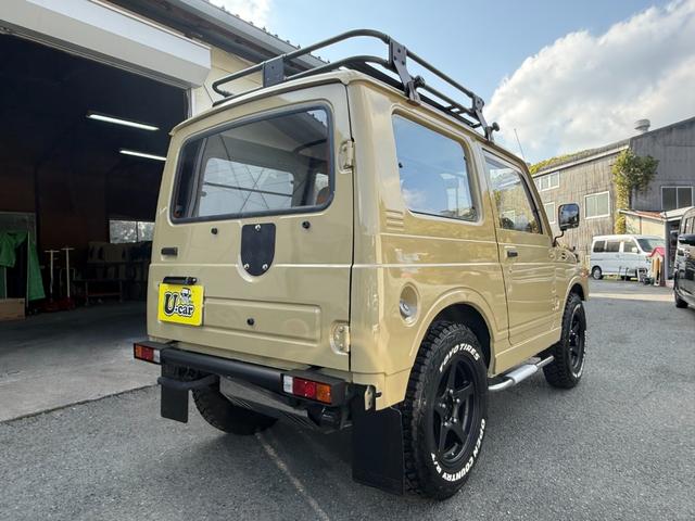 ジムニー ワイルドウインドリミテッド　オールペイント　社外バンパー　ディスプレイオーディオ　サイドステップ　ルーフキャリア　１６インチアルミホイール　タンクガード（7枚目）