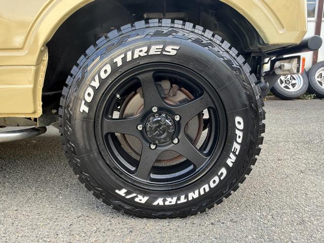 ジムニー ワイルドウインドリミテッド　オールペイント　社外バンパー　ディスプレイオーディオ　サイドステップ　ルーフキャリア　１６インチアルミホイール　タンクガード（27枚目）