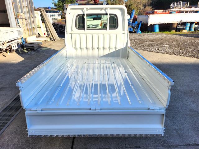 ハイゼットトラック エアコン・パワステ　スペシャル　５速ＭＴ／４ＷＤ／エアコン／パワステ／エアバッグ装備／荷台あおりアルミ縞板カバー（8枚目）