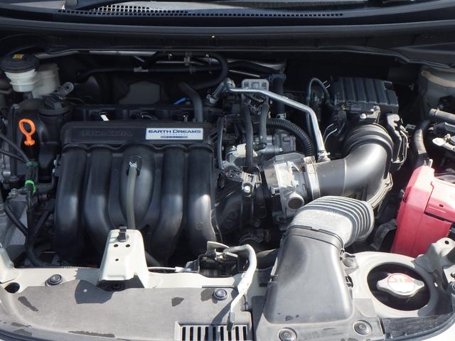 フィット 13G・F リヤカメラ 地デジ 記録簿 助手席エアバック キーレス ドラレコ AAC パワーウィンドー スマートキ- パワステ 運転席エアバッグ DVD 横滑防止装置 ナビ&TV ABS ETC車載器(3枚目)