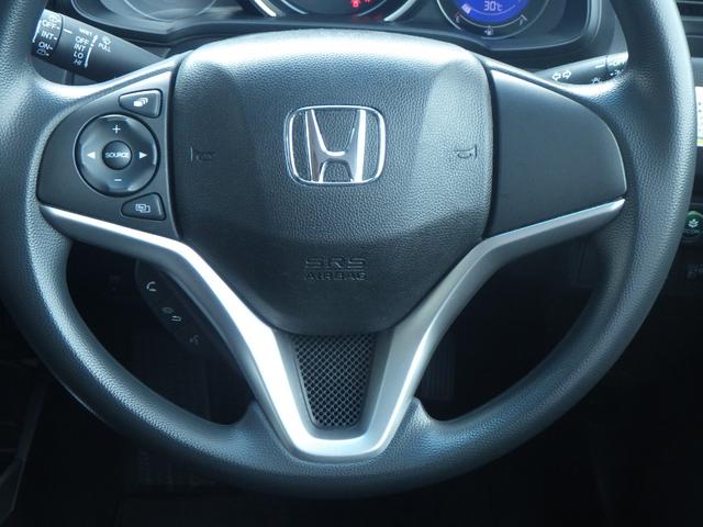 フィット 13G・F リヤカメラ 地デジ 記録簿 助手席エアバック キーレス ドラレコ AAC パワーウィンドー スマートキ- パワステ 運転席エアバッグ DVD 横滑防止装置 ナビ&TV ABS ETC車載器(4枚目)