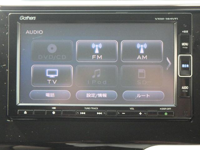 フィット 13G・F リヤカメラ 地デジ 記録簿 助手席エアバック キーレス ドラレコ AAC パワーウィンドー スマートキ- パワステ 運転席エアバッグ DVD 横滑防止装置 ナビ&TV ABS ETC車載器(7枚目)