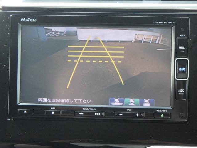 フィット 13G・F リヤカメラ 地デジ 記録簿 助手席エアバック キーレス ドラレコ AAC パワーウィンドー スマートキ- パワステ 運転席エアバッグ DVD 横滑防止装置 ナビ&TV ABS ETC車載器(8枚目)