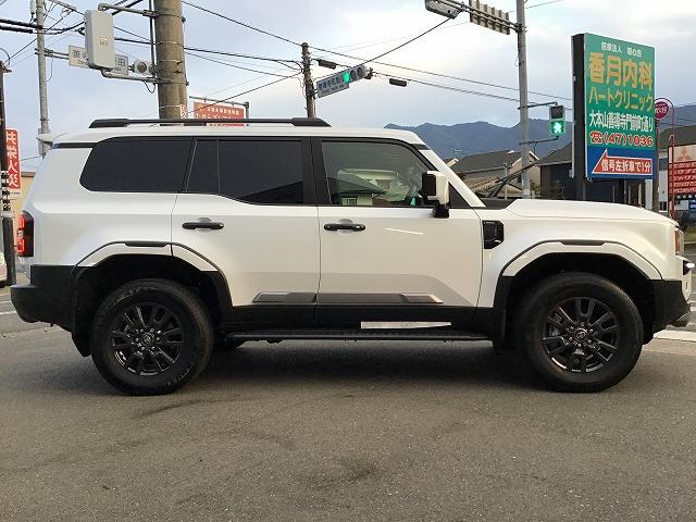 ランドクルーザー250 VX 12.3インチナビ 全方位モニター 前後ドラレコ サンルーフ デジタルインナーミラー 丸目LEDヘッドライト モデリスタPKG カラードオーバーフェンダー リヤスポイラー パワーバックドア 禁煙車(5枚目)