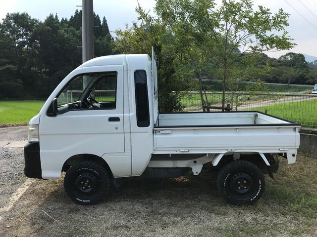 ジャンボ エアコン・パワステ・パワーウィンドウ・2インチリフトアップ・デフロック4WD・14インチブロックパターンタイヤ・タイミングベルト交換済み・5速マニュアル車・車検整備付き(9枚目)