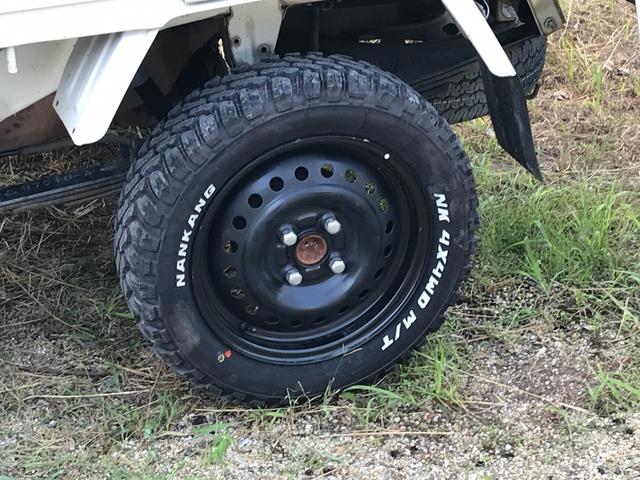 ジャンボ エアコン・パワステ・パワーウィンドウ・2インチリフトアップ・デフロック4WD・14インチブロックパターンタイヤ・タイミングベルト交換済み・5速マニュアル車・車検整備付き(10枚目)