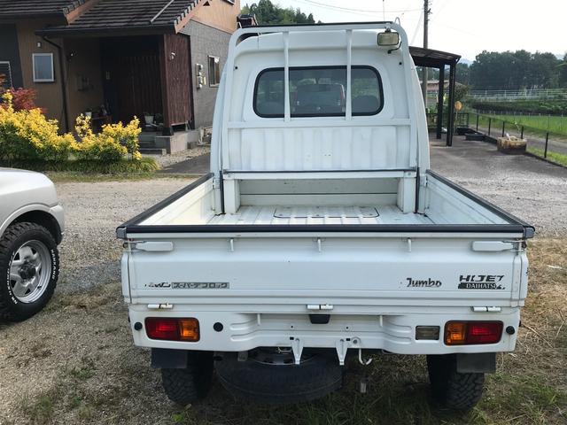 ジャンボ エアコン・パワステ・パワーウィンドウ・2インチリフトアップ・デフロック4WD・14インチブロックパターンタイヤ・タイミングベルト交換済み・5速マニュアル車・車検整備付き(17枚目)