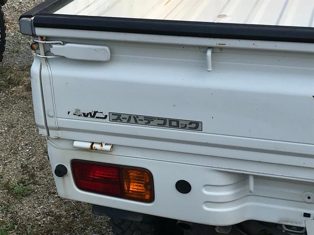 ジャンボ エアコン・パワステ・パワーウィンドウ・2インチリフトアップ・デフロック4WD・14インチブロックパターンタイヤ・タイミングベルト交換済み・5速マニュアル車・車検整備付き(18枚目)