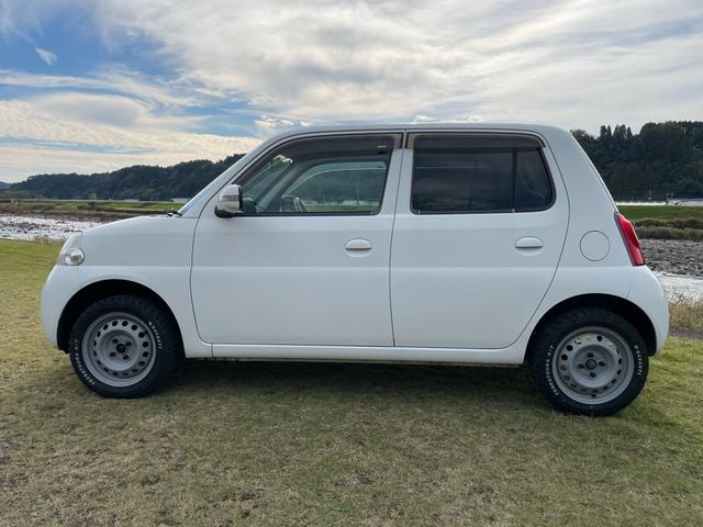 エッセ Ｘ　リフトアップカスタム　車検Ｒ９年１１月　４ＡＴ　電動格納ウインカーミラー　リフトアップサス　１４インチＡ／Ｔタイヤ（5枚目）