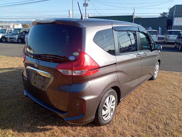 フリード G・ホンダセンシング ETC バックカメラ ナビ オートクルーズコントロール レーンアシスト 衝突被害軽減システム 両側電動スライドドア スマートキー アイドリングストップ 3列シート CVT CD USB(17枚目)