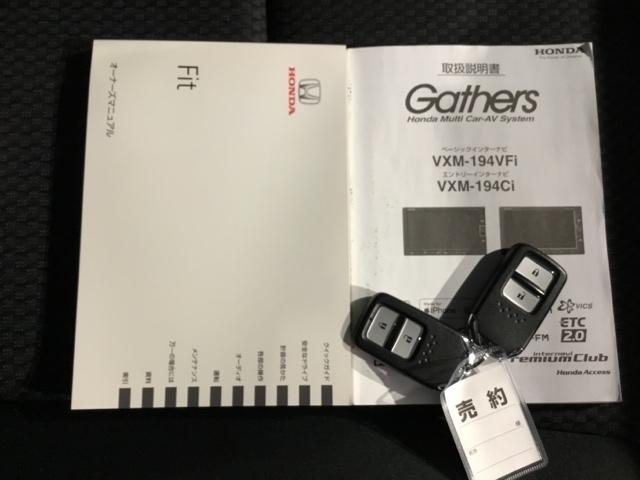 フィット １３Ｇ・Ｆ　メモリーナビ　ＥＴＣ　リアカメラ　リヤカメラ　アクティブクルーズ　衝突被害軽減　イモビライザー　助手席エアバック　キーレス　ＡＡＣ　パワーウィンドー　スマートキ－　パワステ　ＵＳＢ　運転席エアバッグ（26枚目）