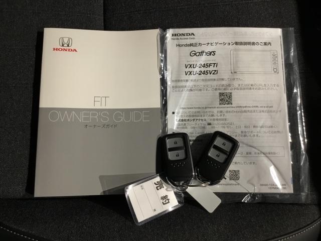 フィット ホーム　メモリーナビ　ドラレコ　ＥＴＣ　衝突軽減　リアカメラ　ソナー　ＵＳＢ接続　ＡＡＣ　横滑り防止機能　サイドエアバック　ＬＥＤライト　クルーズコントロール　パワーウィンドウ　スマキー　ＤＶＤ　ナビＴＶ（28枚目）