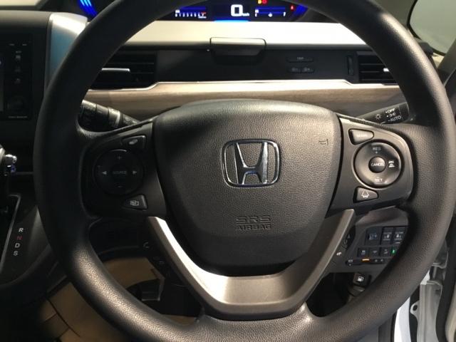 フリード Ｇ・ホンダセンシング　ディスプレイオーディオ　ワンセグ　リアカメラ　ＥＴＣ　追突被害軽減ブレーキ　Ｗエアバッグ　パワーウィンドウ　アクティブクルーズコントロール　スマートキ　カラーバックモニター　ＶＳＡ　エアコン　キーレス（3枚目）