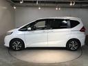 フリード Ｇ・ホンダセンシング　両側電動スライドドア　リアカメラ　ＥＴＣ　Ｗ電動ドア　キーフリ　スマートキーシステム　カーテンエアバッグ　イモビ　カラーバックモニター　横滑防止装置　ＬＥＤランプ　整備点検記録簿　エアコン　クルコン（7枚目）