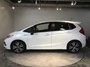 フィットハイブリッド Sホンダセンシング メモリーナビ フルセグ ETC USBポート サイドSRS パワステ 整備記録簿 パワーウインドウ ナビTV アクティブクルーズコントロール AAC スマ-トキ- 盗難防止装置 エアバッグ ABS(7枚目)