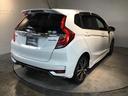 フィットハイブリッド Sホンダセンシング メモリーナビ フルセグ ETC USBポート サイドSRS パワステ 整備記録簿 パワーウインドウ ナビTV アクティブクルーズコントロール AAC スマ-トキ- 盗難防止装置 エアバッグ ABS(8枚目)