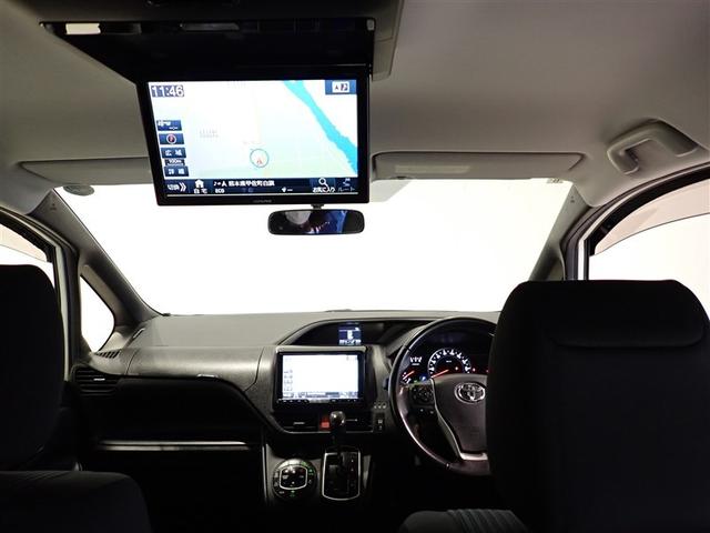 ヴォクシー ＺＳ　煌　地上デジタル　両側パワードア　アイドリングストップ車　パワーウィンド　横滑防止　整備記録簿　ＤＶＤ可　盗難防止装置　スマートエントリー　Ｂカメラ　ＬＥＤヘッドライト　メモリーナビ　３列シート　ＥＴＣ（14枚目）