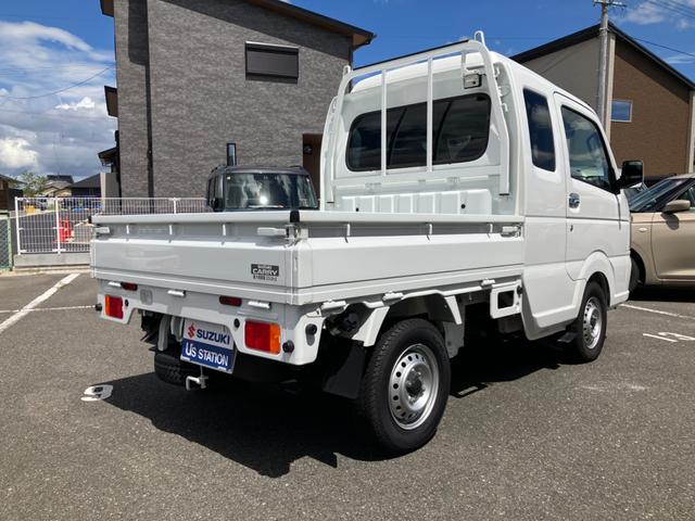 スーパーキャリイ スーパーキャリイ　Ｘ　４型　衝突被害軽減ブレーキ　キーレス　オートライト　スズキセーフティーサポート　衝突被害軽減システム　横滑り防止機能　衝突安全ボディ　盗難防止システム　キーレスエントリー　スモークガラス　後方誤発進抑制機能　アイドリングストップ（5枚目）