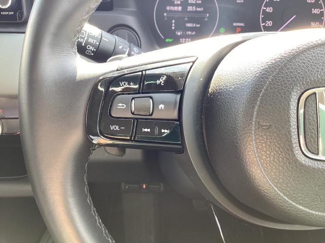 ヴェゼル ｅ：ＨＥＶＸ・ＨｕＮＴパッケージ　当社デモカー　ＨＯＮＤＡＣＯＮＮＥＣＴナビ　ドライブレコーダー前後　１６インチアルミホイール　ルーフレール　コンビシート　本革巻きステアリング　車線逸脱防止　アダクティブクルーズコントロール　Ｂカメラ（30枚目）