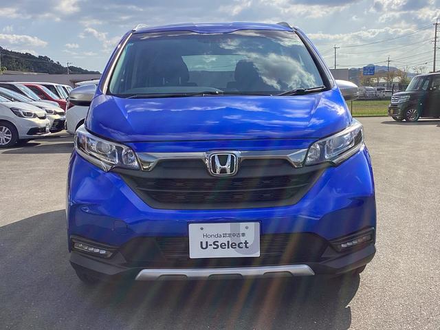 フリード クロスター 当社レンタカー 純正9インチナビ ドライブレコーダー フルセグTV ETC LEDヘッドライト+LEDアクティブコーナーリングライト オートエアコン 両側パワースライドドア ホンダセンシング 禁煙車(2枚目)