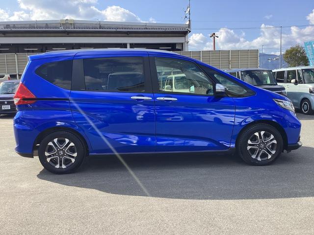 フリード クロスター 当社レンタカー 純正9インチナビ ドライブレコーダー フルセグTV ETC LEDヘッドライト+LEDアクティブコーナーリングライト オートエアコン 両側パワースライドドア ホンダセンシング 禁煙車(4枚目)