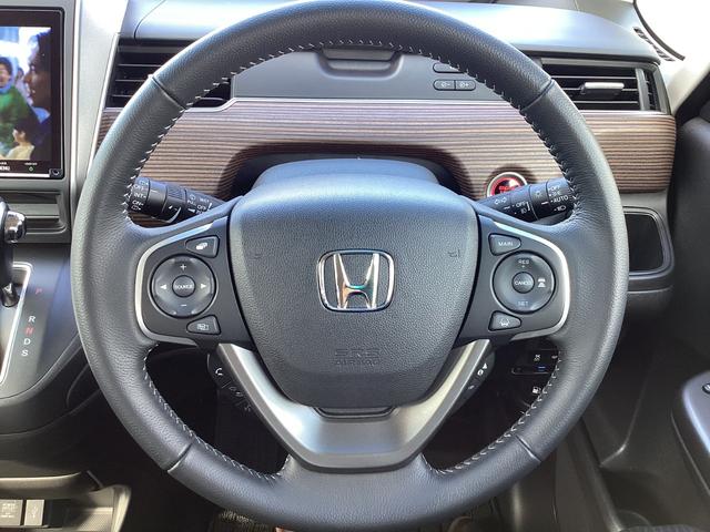 フリード クロスター 当社レンタカー 純正9インチナビ ドライブレコーダー フルセグTV ETC LEDヘッドライト+LEDアクティブコーナーリングライト オートエアコン 両側パワースライドドア ホンダセンシング 禁煙車(27枚目)