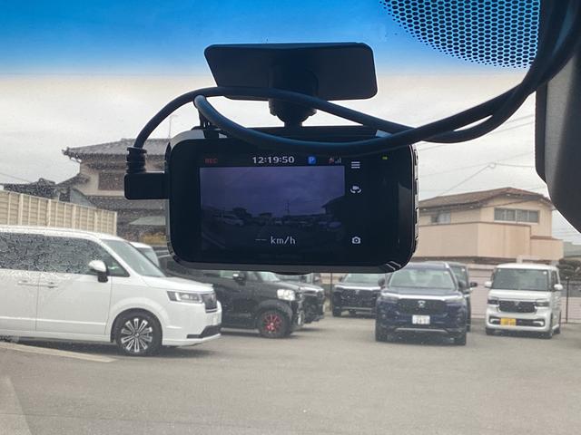 フィットハイブリッド Lパッケージ 純正ナビ 地デジ CD/DVD ドライブレコーダー前後 ETC オートエアコン オートライト オートリトラミラーLEDヘッドライト 社外アルミホイール 電動格納式ミラー 禁煙 AUTOライト ECON(15枚目)