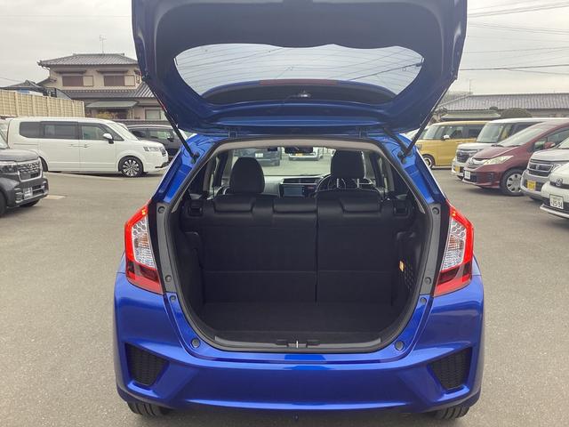 フィットハイブリッド Lパッケージ 純正ナビ 地デジ CD/DVD ドライブレコーダー前後 ETC オートエアコン オートライト オートリトラミラーLEDヘッドライト 社外アルミホイール 電動格納式ミラー 禁煙 AUTOライト ECON(22枚目)