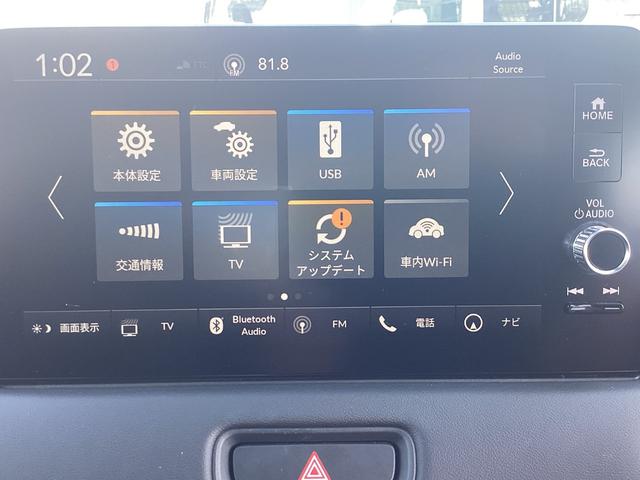 ヴェゼル ｅ：ＨＥＶＺ　純正ナビ　フルセグ　ＢＬＵＥＴＯＯＴ　純正ＯＰアルミ　マルチビューカメラ　ブラインドスポットインフォメーション　ハンズフリーアクセスパワーテールゲート　運転席助手席シートヒーター　後退出庫サポート（12枚目）