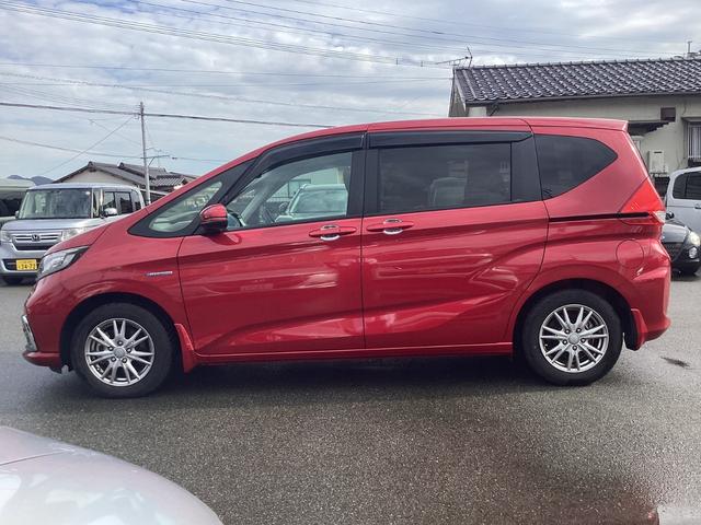 フリードハイブリッド ハイブリッド・Ｇホンダセンシング　７人乗り　純正ナビ　　フルセグＴＶ　ドライブレコーダー前後　ＥＴＣ　両側パワースライドドア　社外アルミ　シートバックテーブル　オートリトラミラー　ＬＥＤヘッドライト＋アクティブコーナリングライト　禁煙（5枚目）