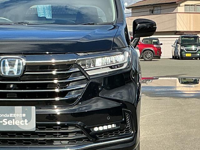 オデッセイハイブリッド ｅ：ＨＥＶアブソルート・ＥＸ　１０インチナビＴＶ・マルチビューカメラ・リア席モニター・前後ドライブレコーダー・Ｂｌｕｅｔｏｏｔｈ・オットマン・ワンオーナー車　電動Ｒゲート　ＬＥＤライト　両側ＰＳＤ　パワ－シ－ト　本革シート　イモビ（15枚目）