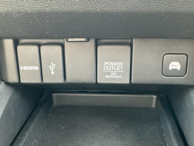 オデッセイハイブリッド ｅ：ＨＥＶアブソルート・ＥＸ　１０インチナビＴＶ・マルチビューカメラ・リア席モニター・前後ドライブレコーダー・Ｂｌｕｅｔｏｏｔｈ・オットマン・ワンオーナー車　電動Ｒゲート　ＬＥＤライト　両側ＰＳＤ　パワ－シ－ト　本革シート　イモビ（18枚目）