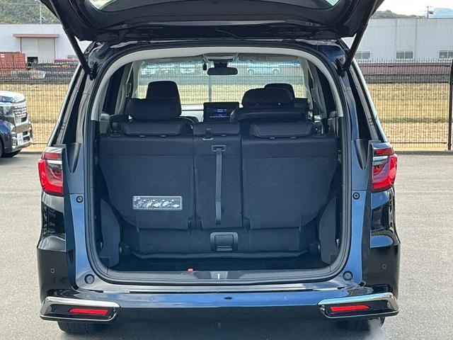 オデッセイハイブリッド ｅ：ＨＥＶアブソルート・ＥＸ　１０インチナビＴＶ・マルチビューカメラ・リア席モニター・前後ドライブレコーダー・Ｂｌｕｅｔｏｏｔｈ・オットマン・ワンオーナー車　電動Ｒゲート　ＬＥＤライト　両側ＰＳＤ　パワ－シ－ト　本革シート　イモビ（30枚目）