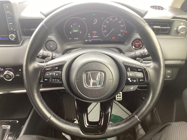 ヴェゼル ｅ：ＨＥＶＺ　純正９インチナビ　フルセグＴＶ　ＢＬＵＥＴＯＯＴ　前後ドラレコ　ビルトインＥＴＣ　ブラインドスポットインフォメーション　前席シートヒーター　ハンズフリーアクセスパワーテールゲート　ＬＥＤヘッドライト（31枚目）