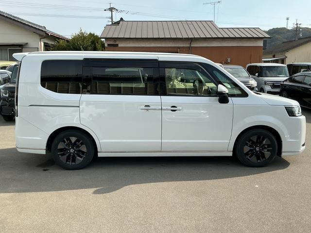ステップワゴン e:HEVスパーダ HONDACONNECTナビゲーション フリップダウンリヤ席モニター ドラレコ前後 ETC ブラインドスポットインフォメーション パワーテールゲート 2列目オットマン 前列USBチャージャー スマキー(3枚目)
