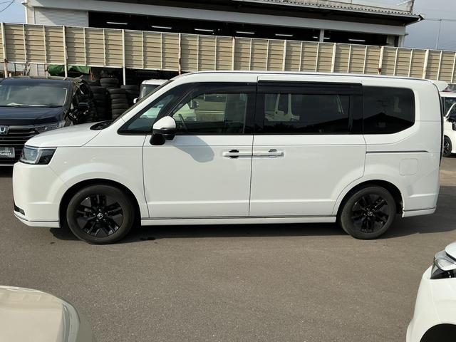 ステップワゴン e:HEVスパーダ HONDACONNECTナビゲーション フリップダウンリヤ席モニター ドラレコ前後 ETC ブラインドスポットインフォメーション パワーテールゲート 2列目オットマン 前列USBチャージャー スマキー(4枚目)