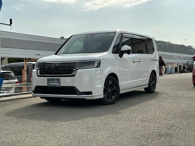 ステップワゴン e:HEVスパーダ HONDACONNECTナビゲーション フリップダウンリヤ席モニター ドラレコ前後 ETC ブラインドスポットインフォメーション パワーテールゲート 2列目オットマン 前列USBチャージャー スマキー(5枚目)