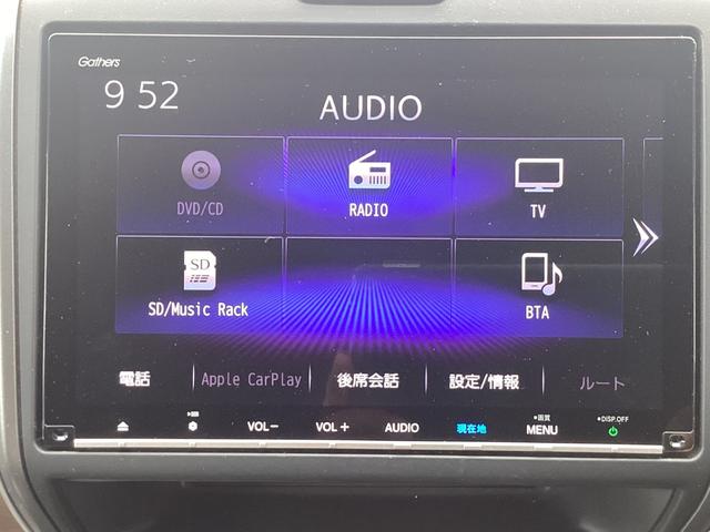 フリードハイブリッド ハイブリッド・Ｇホンダセンシング　９インチナビ　ＥＴＣ　ドラレコ前後　リア両側パワースライドドア　ＬＥＤヘッドライト＋アクティブコーナリングライト　センターテーブル　オートリトラミラー　ロールサンシェード運転席助手席シートヒーター（12枚目）