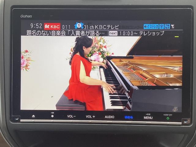 フリードハイブリッド ハイブリッド・Ｇホンダセンシング　９インチナビ　ＥＴＣ　ドラレコ前後　リア両側パワースライドドア　ＬＥＤヘッドライト＋アクティブコーナリングライト　センターテーブル　オートリトラミラー　ロールサンシェード運転席助手席シートヒーター（13枚目）