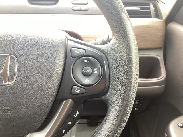 フリードハイブリッド ハイブリッド・Ｇホンダセンシング　９インチナビ　ＥＴＣ　ドラレコ前後　リア両側パワースライドドア　ＬＥＤヘッドライト＋アクティブコーナリングライト　センターテーブル　オートリトラミラー　ロールサンシェード運転席助手席シートヒーター（19枚目）