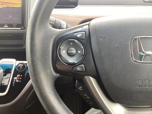 フリードハイブリッド ハイブリッド・Ｇホンダセンシング　９インチナビ　ＥＴＣ　ドラレコ前後　リア両側パワースライドドア　ＬＥＤヘッドライト＋アクティブコーナリングライト　センターテーブル　オートリトラミラー　ロールサンシェード運転席助手席シートヒーター（20枚目）