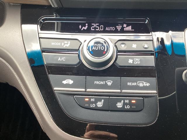 フリードハイブリッド ハイブリッド・Ｇホンダセンシング　９インチナビ　ＥＴＣ　ドラレコ前後　リア両側パワースライドドア　ＬＥＤヘッドライト＋アクティブコーナリングライト　センターテーブル　オートリトラミラー　ロールサンシェード運転席助手席シートヒーター（22枚目）