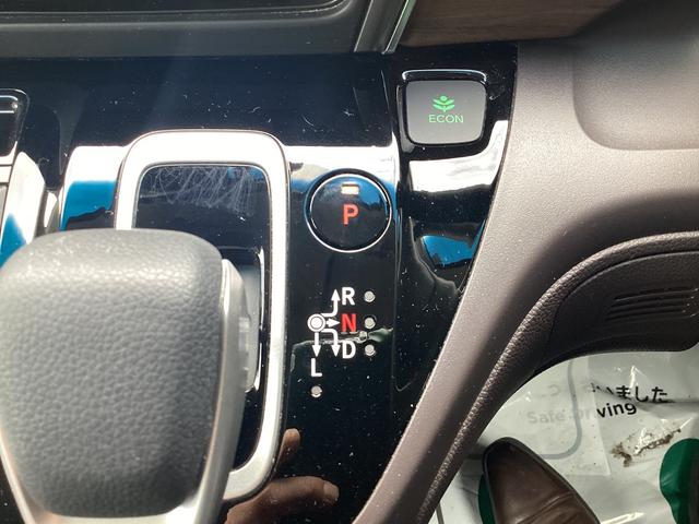 フリードハイブリッド ハイブリッド・Ｇホンダセンシング　９インチナビ　ＥＴＣ　ドラレコ前後　リア両側パワースライドドア　ＬＥＤヘッドライト＋アクティブコーナリングライト　センターテーブル　オートリトラミラー　ロールサンシェード運転席助手席シートヒーター（25枚目）