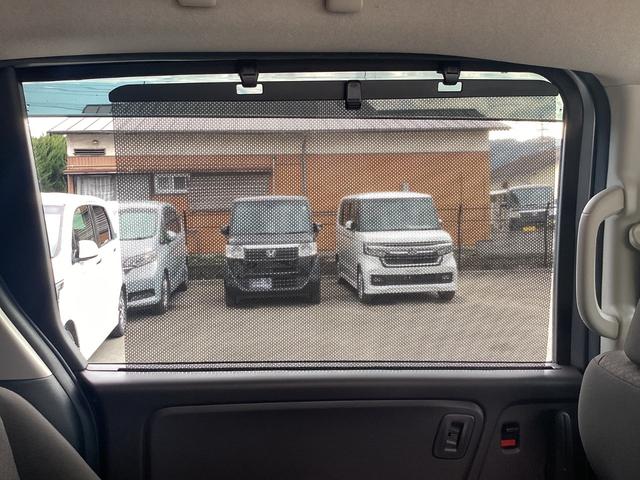 フリードハイブリッド ハイブリッド・Ｇホンダセンシング　９インチナビ　ＥＴＣ　ドラレコ前後　リア両側パワースライドドア　ＬＥＤヘッドライト＋アクティブコーナリングライト　センターテーブル　オートリトラミラー　ロールサンシェード運転席助手席シートヒーター（32枚目）