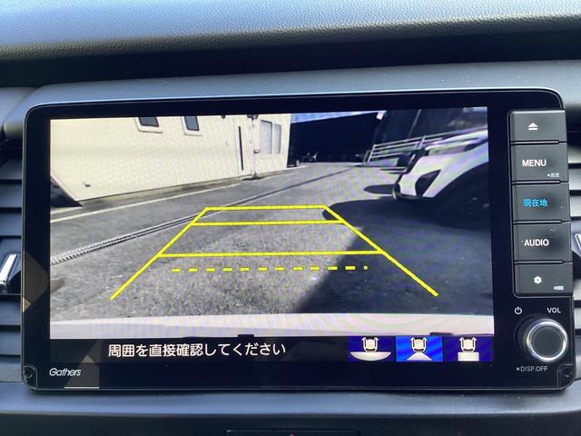 フィット ｅ：ＨＥＶホーム　純正９インチナビＴＶ・モデューロエアロ・前後ドライブレコーダー・Ｂｌｕｅｔｏｏｔｈ・バックカメラ・ワンオーナー車　前後誤発進抑制機能　助手席エアバッグ　運転席エアバッグ　１オナ　アイドリングストップ（9枚目）