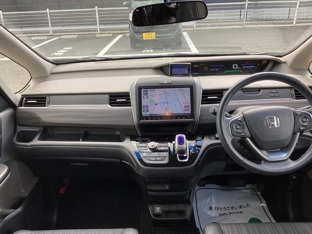 フリードハイブリッド ハイブリッド・EX 純正9インチナビTV・CSパッケージ・モデューロエアロ・ドライブレコーダー・ワンオーナー車 1オナ 地デジフルセグTV シ-トヒ-タ- 整備記録簿 リヤカメラ LEDライト フルオートエアコン ABS(4枚目)