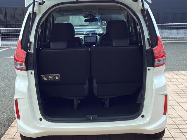 フリードハイブリッド ハイブリッド・EX 純正9インチナビTV・CSパッケージ・モデューロエアロ・ドライブレコーダー・ワンオーナー車 1オナ 地デジフルセグTV シ-トヒ-タ- 整備記録簿 リヤカメラ LEDライト フルオートエアコン ABS(26枚目)