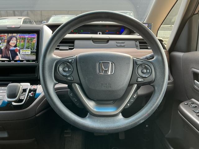 フリードハイブリッド ハイブリッド・Ｇホンダセンシング　９インチナビＴＶ・Ｃパッケージ・前後ドライブレコーダー・Ｂｌｕｅｔｏｏｔｈ・バックカメラ・ワンオーナー車　軽減ブレーキ　キーフリーシステム　Ｂｌｕｅｔｏｏｔｈ音楽　ミュージックプレイヤー接続可　記録簿（16枚目）