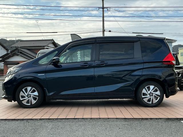 フリードハイブリッド ハイブリッド・Ｇホンダセンシング　９インチナビＴＶ・Ｃパッケージ・前後ドライブレコーダー・Ｂｌｕｅｔｏｏｔｈ・バックカメラ・ワンオーナー車　軽減ブレーキ　キーフリーシステム　Ｂｌｕｅｔｏｏｔｈ音楽　ミュージックプレイヤー接続可　記録簿（32枚目）